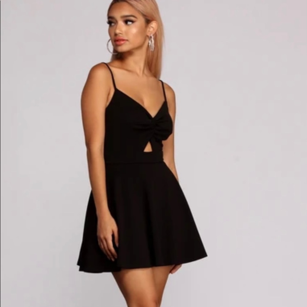 TRENDY TWIST FRONT SKATER ROMPER